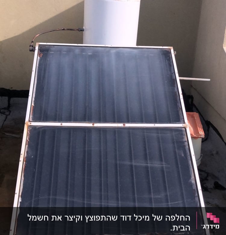 דוד שמש עם קולטים על גג